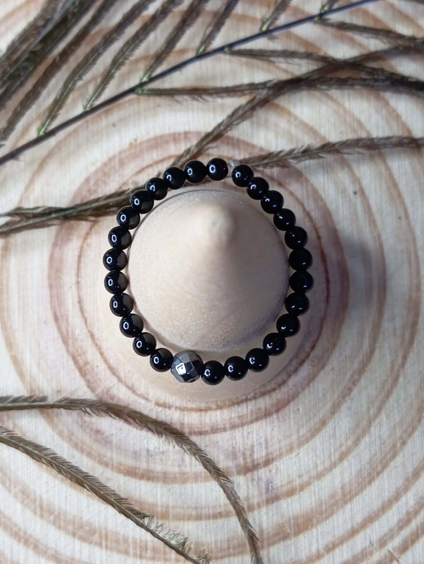 Bague onyx et hématite facettée centrale
